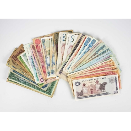 140 - World coinage and bank notes - emphasis on South Africa, Zimbabwe etc. Comprising: 1: A bag containi... 