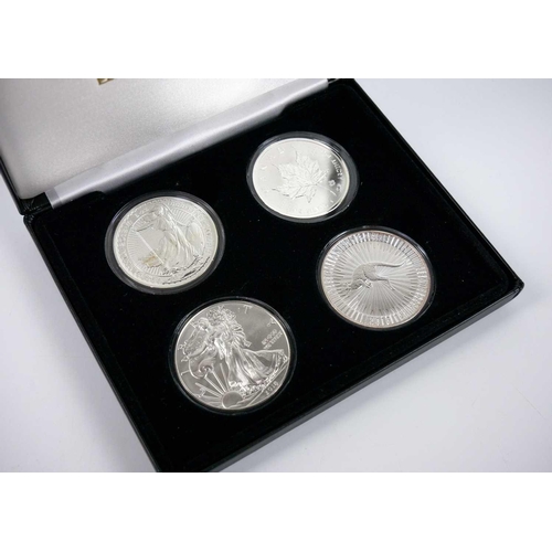 153 - GB, Canada, Australia and USA silver crown size coins (total four coins) Compising an attractive cas... 