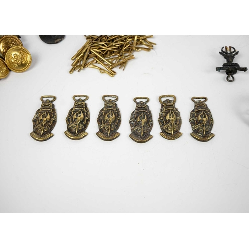 213 - Military badges, buttons, Trench Art etc Comprising: 1: Six military badges from South Africa 2: 191... 