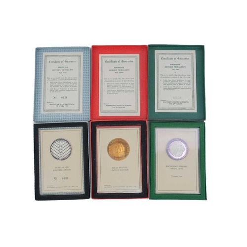 229 - Rhodesia boxed historical silver and bronze commemorative medallions etc Comprising: Matthews Manufa... 