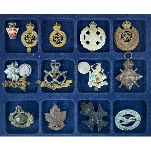 252 - Military medals and medallions Comprising: 1: A wooden lidded box with two trays of cap and other mi... 