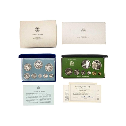 32 - Silver Proof British Commonwealth Coin Sets: Belize and Guyana Comprising: 1: Belize: A cased set of... 