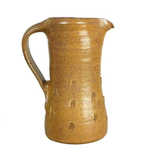 128 - Bernard LEACH (1887-1979) A mediaeval style jug, brown speckled salt glaze with thumbnail decoration... 