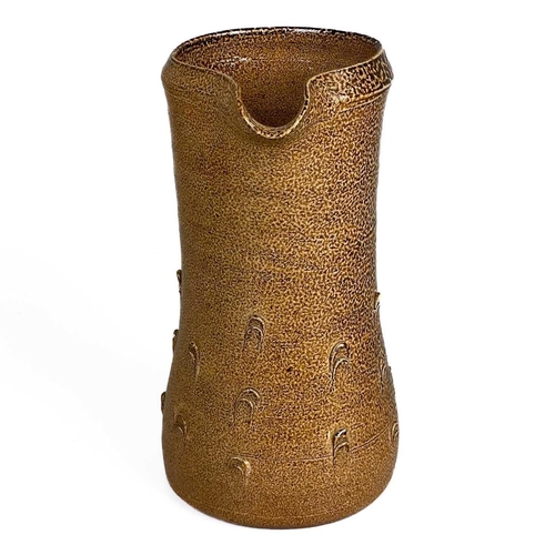 128 - Bernard LEACH (1887-1979) A mediaeval style jug, brown speckled salt glaze with thumbnail decoration... 