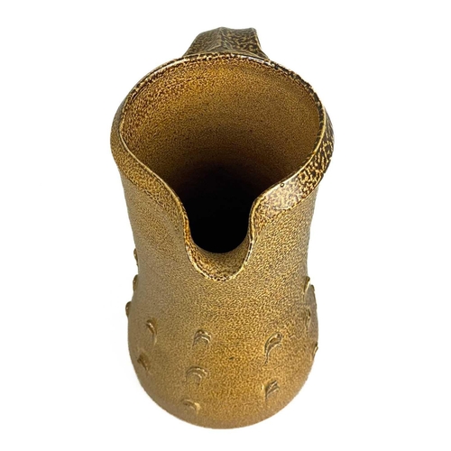 128 - Bernard LEACH (1887-1979) A mediaeval style jug, brown speckled salt glaze with thumbnail decoration... 