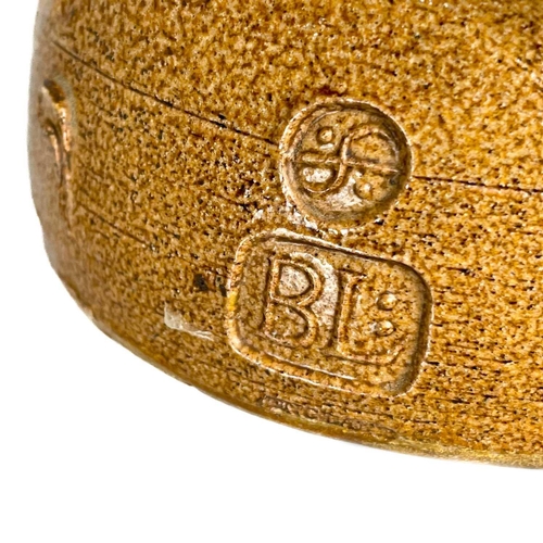 128 - Bernard LEACH (1887-1979) A mediaeval style jug, brown speckled salt glaze with thumbnail decoration... 
