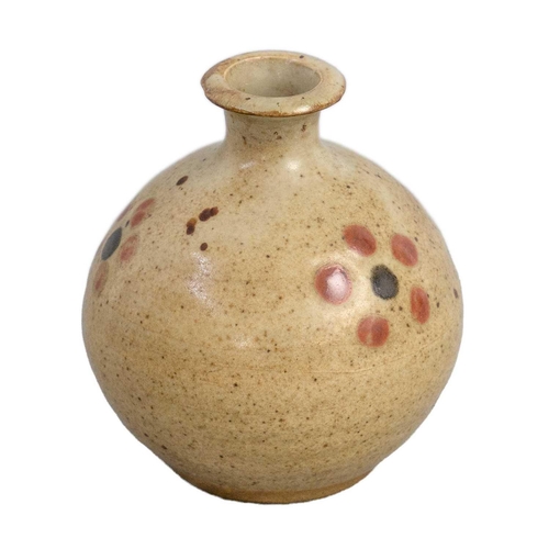 129 - Bernard LEACH (1887-1979) A bud vase, oatmeal glaze with three formal red and black spot designs Hei... 