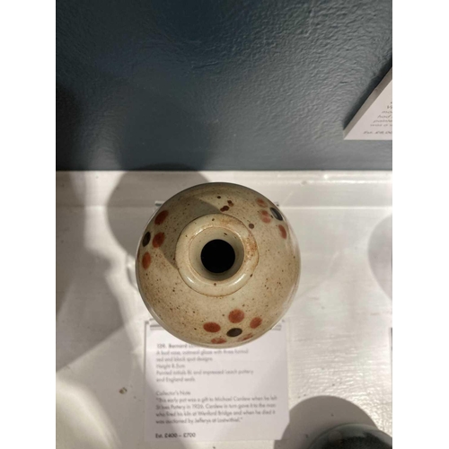 129 - Bernard LEACH (1887-1979) A bud vase, oatmeal glaze with three formal red and black spot designs Hei... 