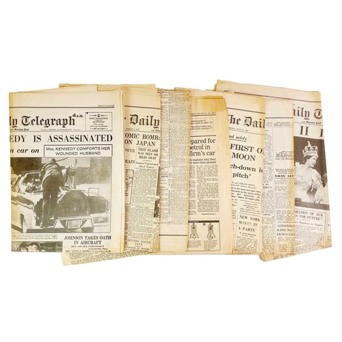 411 - Mid-century newspapers with world-changing headlines The Daily Telegraph newspapers, including: Frid... 