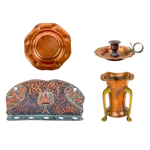 125 - A copper chamberstick by Henry Loveridge. Diameter 18cm, together with an Art Nouveau copper and bra... 