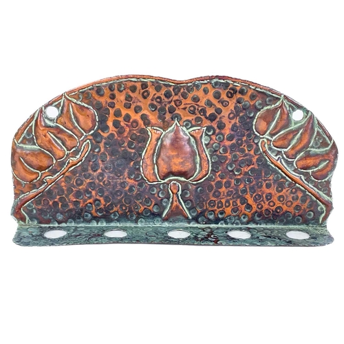 125 - A copper chamberstick by Henry Loveridge. Diameter 18cm, together with an Art Nouveau copper and bra... 