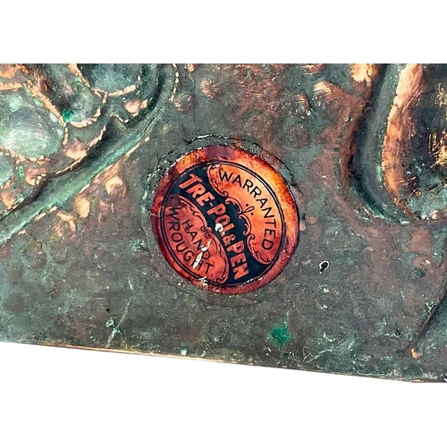 125 - A copper chamberstick by Henry Loveridge. Diameter 18cm, together with an Art Nouveau copper and bra... 