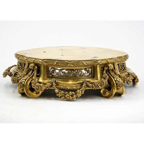 129 - A pair of neo-classical French ormolu, shaped base mounts. With foliate pierced panels below a reed ... 