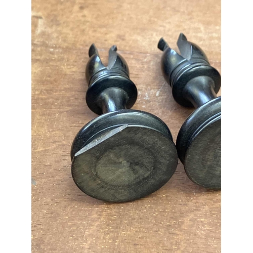 130 - An ebony and boxwood Staunton pattern chess set. Height of king 8.5cm, together with a folding chess... 