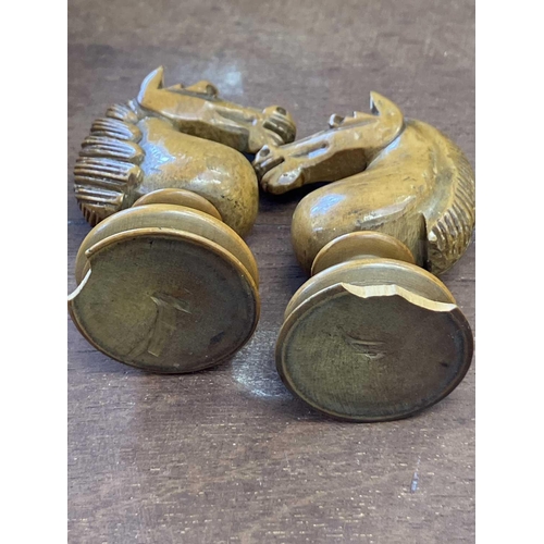 130 - An ebony and boxwood Staunton pattern chess set. Height of king 8.5cm, together with a folding chess... 