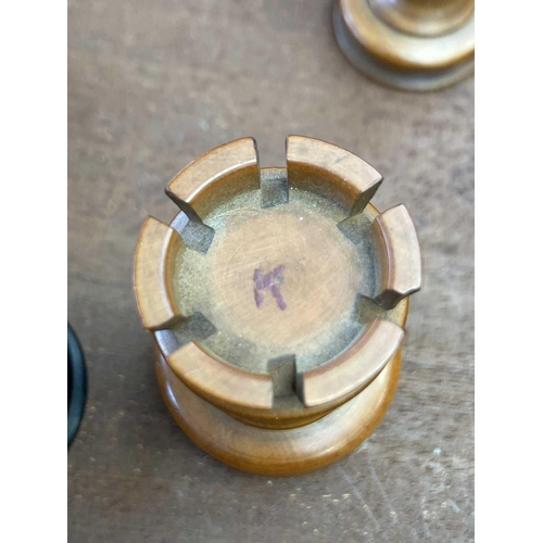 130 - An ebony and boxwood Staunton pattern chess set. Height of king 8.5cm, together with a folding chess... 