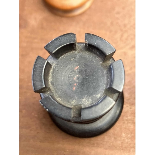 130 - An ebony and boxwood Staunton pattern chess set. Height of king 8.5cm, together with a folding chess... 