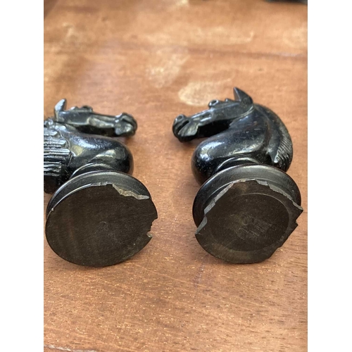 130 - An ebony and boxwood Staunton pattern chess set. Height of king 8.5cm, together with a folding chess... 