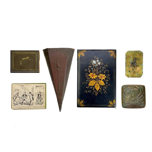 140 - A plaster sculpture of a Sleeping Lion, after Canova. Height 15cm, length 31.5cm, together with a pr... 