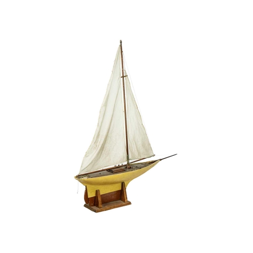 144 - An early 20th century pond yacht White Heather. With stand, height 125cm.