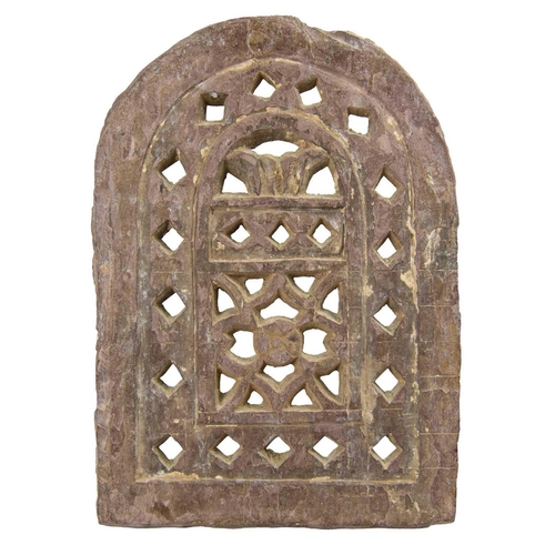 145 - A carved and pierced stone screen & an African stool. The property of Peter Hone. The screen 33cm x ... 