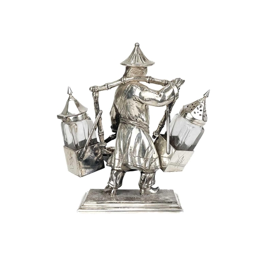 148 - A Mappin & Webb silver plated novelty condiment set. Modelled as an oriental man with a yoke and bas... 