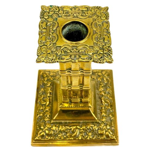 152 - A pair of Victorian brass candlesticks by William Tonks & Sons. With dolphin and flower decoration a... 