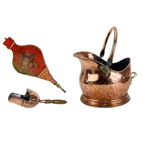 156 - A Victorian copper coal helmet. Height including handle 37.5cm, together with scoop, and a pair of b... 