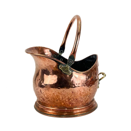 156 - A Victorian copper coal helmet. Height including handle 37.5cm, together with scoop, and a pair of b... 