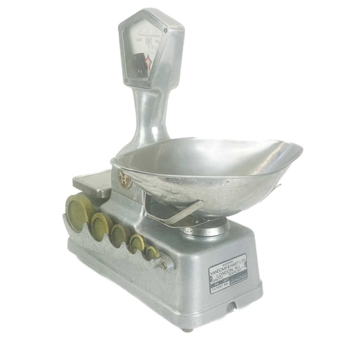 158 - A set of Vandome and Hart Ltd of London aluminium shop scales. With five weights. Height 46cm.