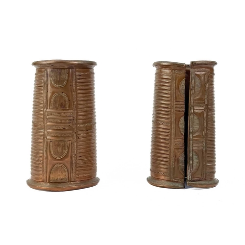 160 - A white metal betel nut box. Length 6cm together with a pair of African cuff bracelets, an Indian br... 