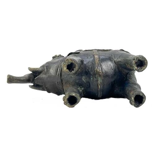 160 - A white metal betel nut box. Length 6cm together with a pair of African cuff bracelets, an Indian br... 