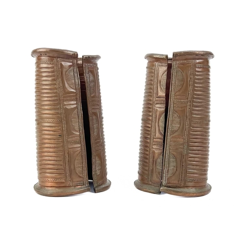 160 - A white metal betel nut box. Length 6cm together with a pair of African cuff bracelets, an Indian br... 