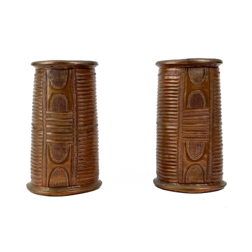 160 - A white metal betel nut box. Length 6cm together with a pair of African cuff bracelets, an Indian br... 