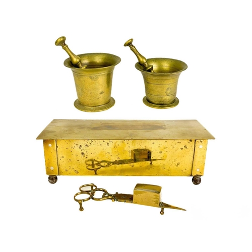 164 - A 19th century brass pestle and mortar. Height 10.3cm together with another brass pestle and mortar,... 