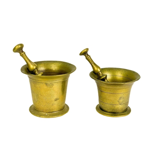 164 - A 19th century brass pestle and mortar. Height 10.3cm together with another brass pestle and mortar,... 