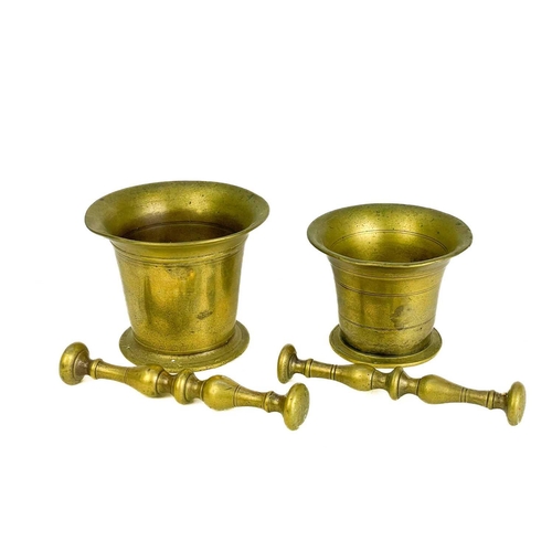 164 - A 19th century brass pestle and mortar. Height 10.3cm together with another brass pestle and mortar,... 