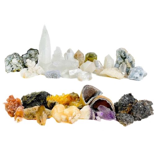 165 - A collection of minerals. To include several large quartz points, a quartz geode, amethyst, and seve... 