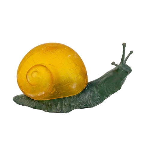 169 - A novelty table lamp in the form of a snail. The simulated bronze body surmounted by an amber glass ... 
