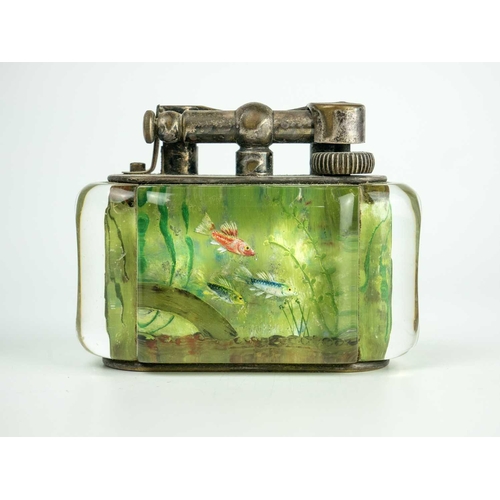 170 - A Dunhill Lucite and electroplate aquarium table lighter. 1950s, set in a typical fashion with three... 
