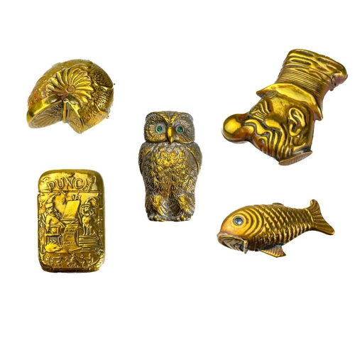 171 - Five Victorian nickel plated brass vesta cases. Comprising: an owl with green glass eyes, a fish wit... 