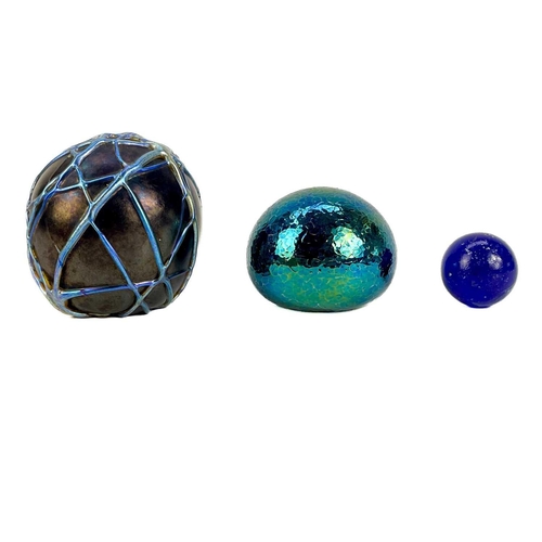 22 - A collection of decorative glassware to include a Tiffany & Co paperweight. In the form of a sleepin... 