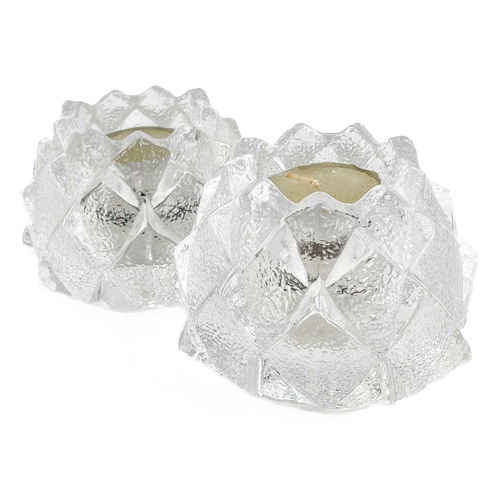 22 - A collection of decorative glassware to include a Tiffany & Co paperweight. In the form of a sleepin... 