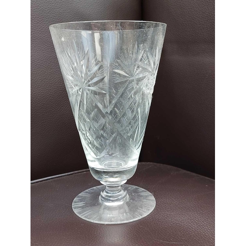 359 - A set of four 19th century English glass rummers. Engraved with flowers, height 12cm together with o... 