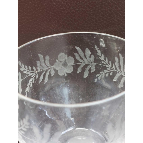 359 - A set of four 19th century English glass rummers. Engraved with flowers, height 12cm together with o... 