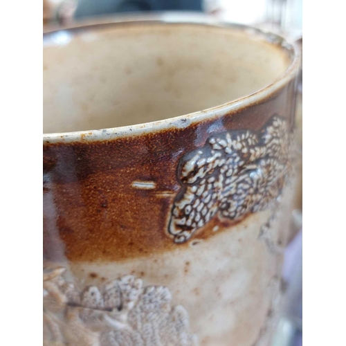 360 - A set of six 19th century English porcelain barrel mask jugs. Tallest 19.5cm together with a twin ha... 