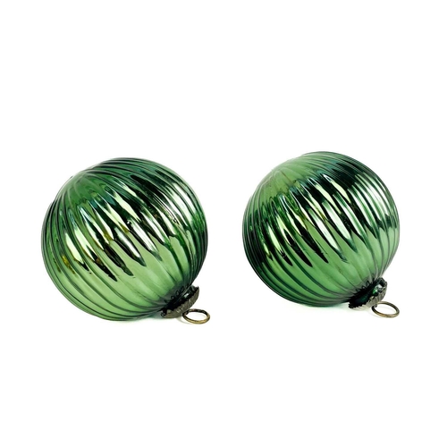 371 - A collection of nine glass hanging balls. In various sizes and colours. The largest measures 12cm in... 