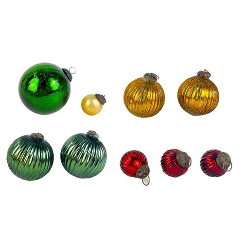 372 - A collection of glass nine hanging balls. In various sizes and colours. The largest measures 12cm in... 