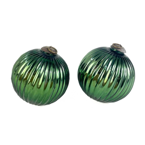 372 - A collection of glass nine hanging balls. In various sizes and colours. The largest measures 12cm in... 