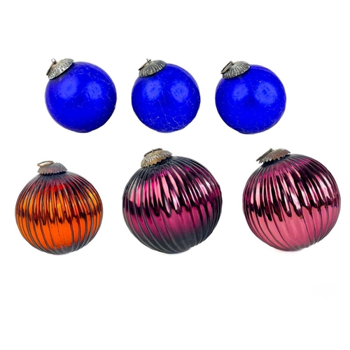 374 - A collection of glass hanging balls, In various sizes and colours. The largest measures 12cm in diam... 